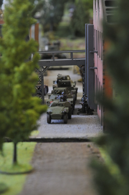 30th Corps armoured cars lead about six tanks into North Nijmegen