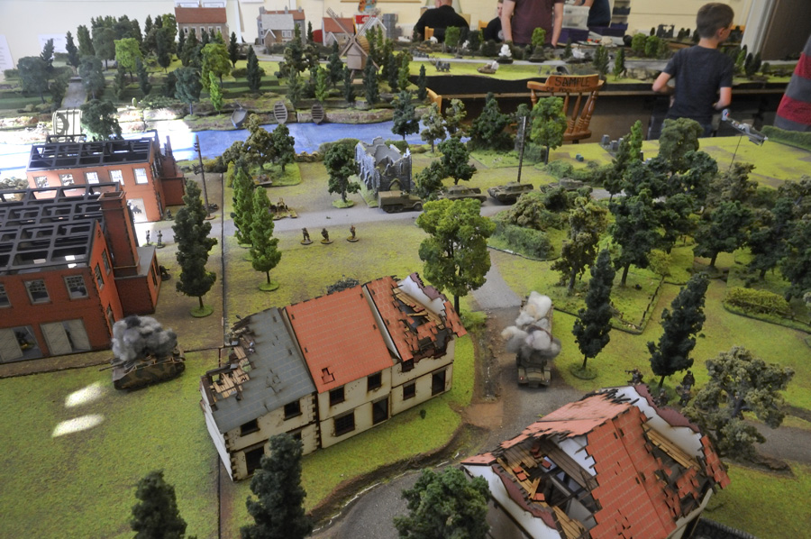 With burnt out Stugs and allied armoured cars littering the foreground, 30th Corps pushes onwards towards Arnhem