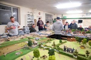 just a dozen blokes in a room, playing a game of Bolt Action